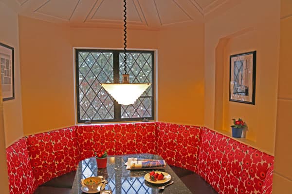 Brighton, NY – Houston Barnard – Cozy built-in booth in octagon-shaped room with turret.