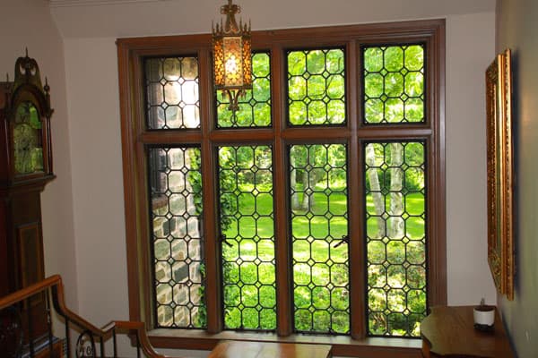 Brighton, NY – Houston Barnard Neighborhood, Second story foyer with gargantuan leaded glass windows
