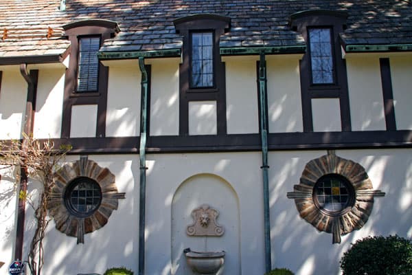 Houston Barnard neighborhood, Brighton, NY – Exquisite circular stone surrounds stained glass windows.