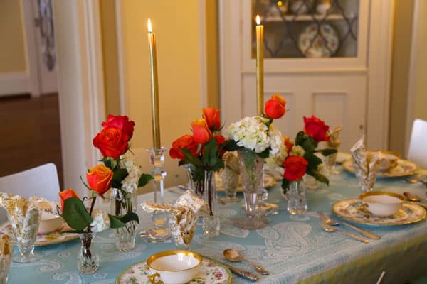 Elegance abounds is this historic dining room by use of vintage plates, collected at an estate sale.
