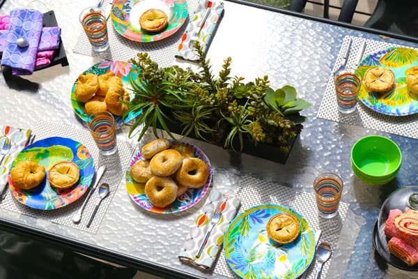 Breakfast is served! This bagel bonanza, served ein plein aire, enables the entire family to enjoy the creekside setting.